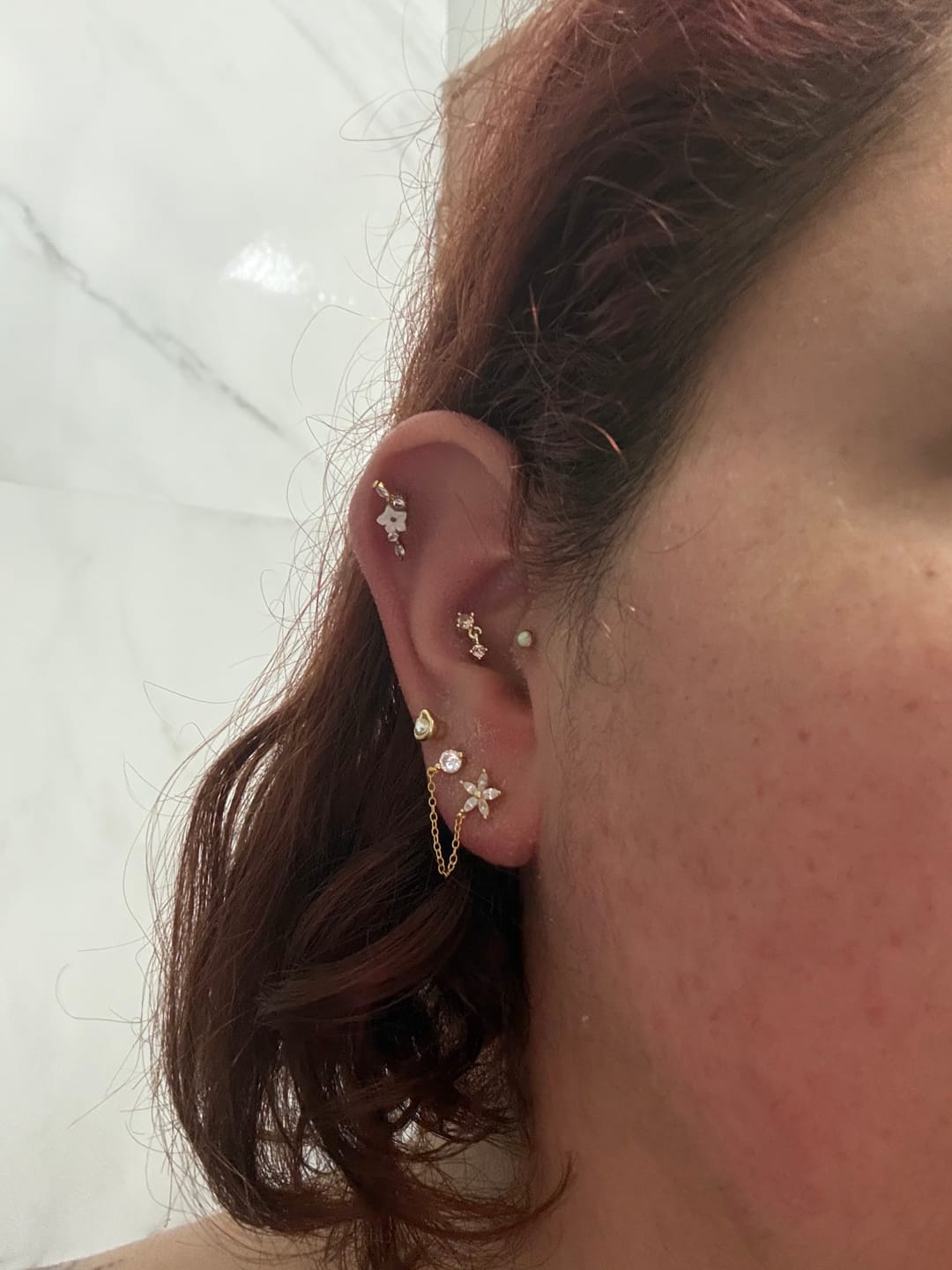 Customer photo review of Piercing de Florecita con Zirconias
