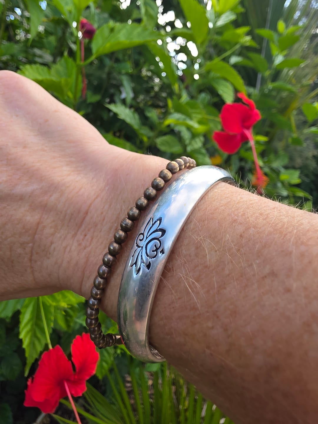 Customer photo review of Buddha Stones Lotus Flower Heart Sutra White Copper Healing Luck Bracelet