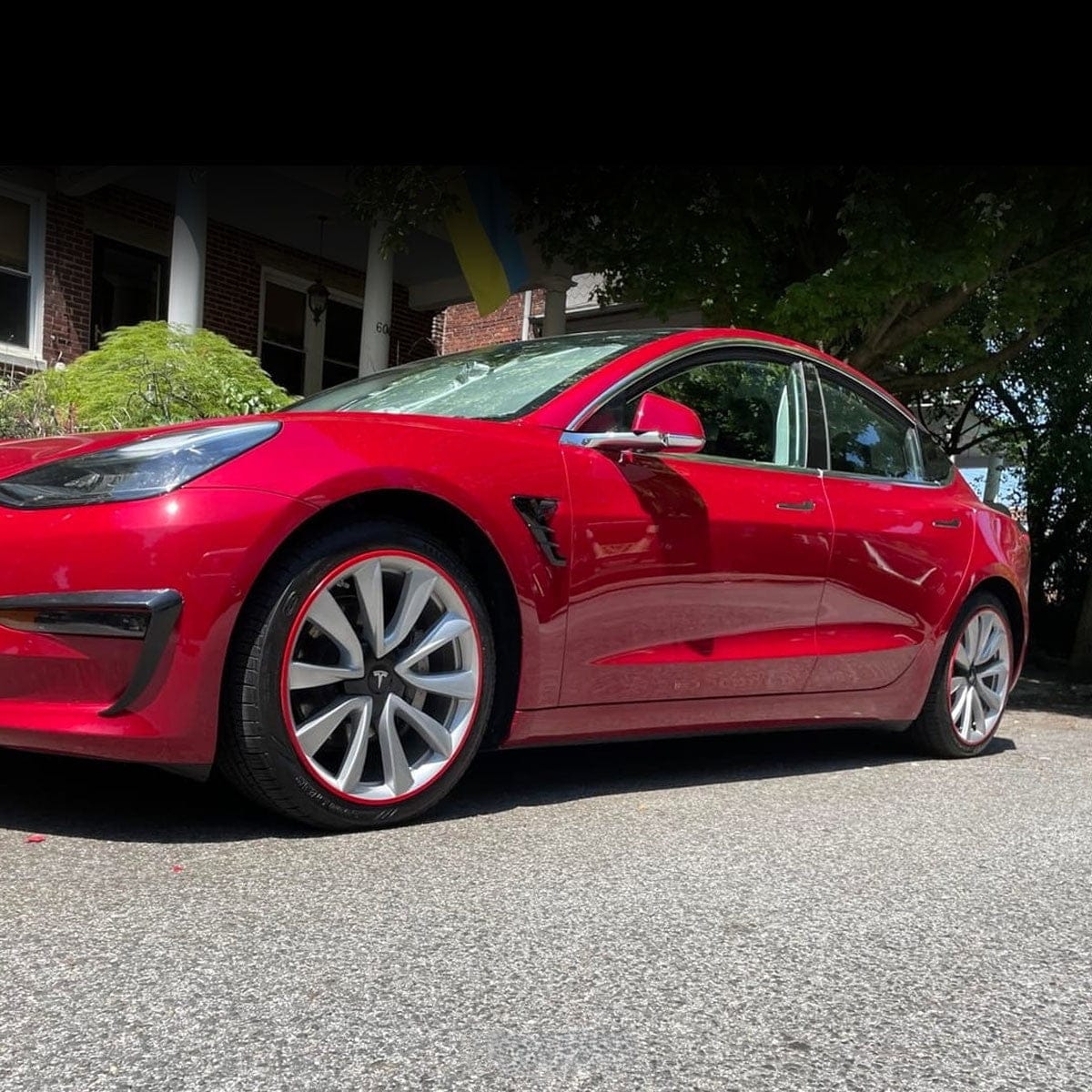 Customer photo review of Aluminum Alloy Wheel Rim Protector Rim Case for Tesla All Models (4 PCS) (2012-2025)