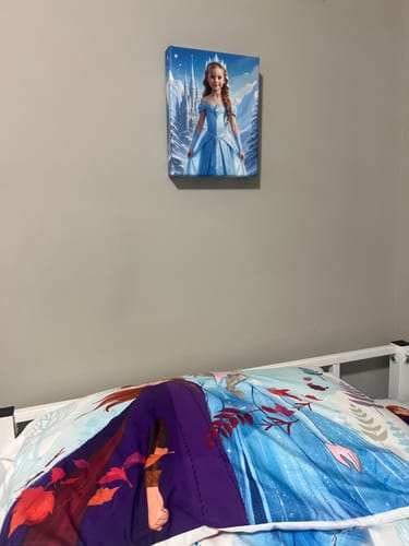 Customer's 'The Ice Princess' portrait displayed on a wall above a child's bed.