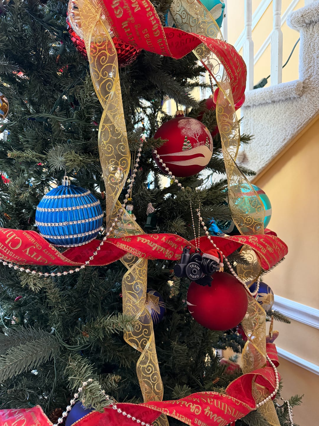 Customer photo review of Personalized Dumbbell Christmas Ornament: Gym Fitness Gift