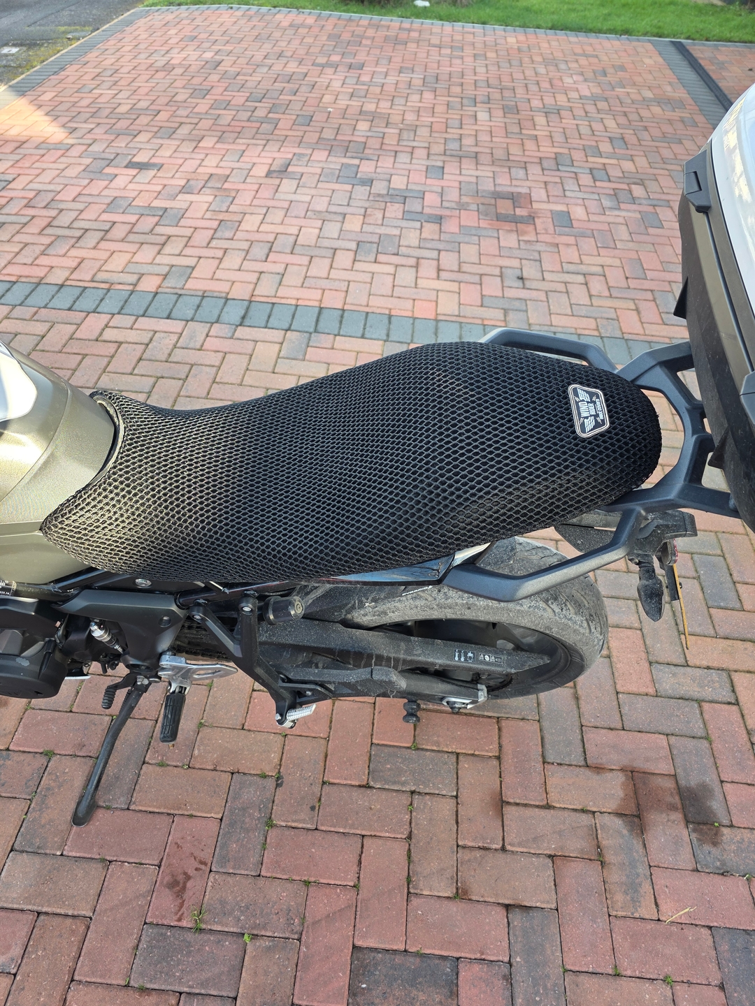 Wind Rider mesh seat cover on a Triumph Tiger Sport 660