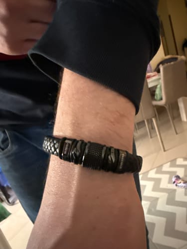 Customer showing the black bracelet with detailed stainless steel beads on their wrist.