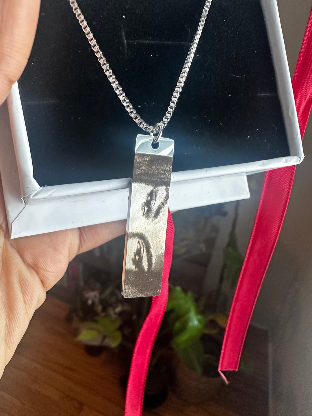Customer photo review of Personalized Eye Photo Necklace
