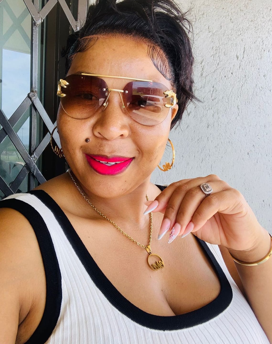 Customer photo review of Gold Precious Era Logo Hoops