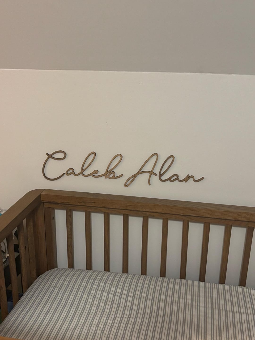 Customer photo review of Wood Name Sign