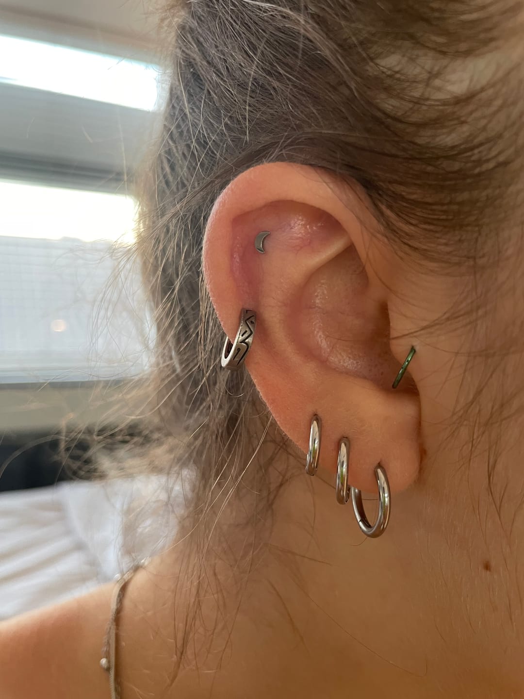 Customer photo review of The Titanium Moon Stud Top