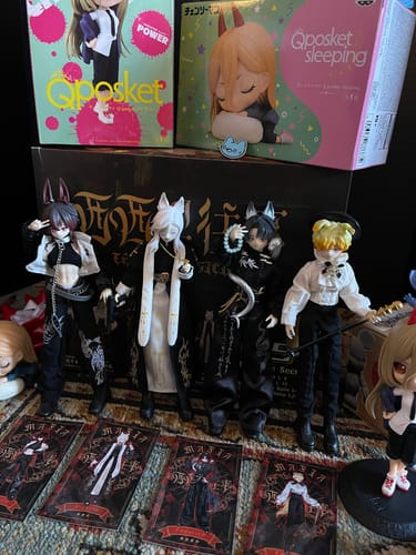 Reviewer's collection of four "The Past In Sicily" action figures displayed with their corresponding character cards.
