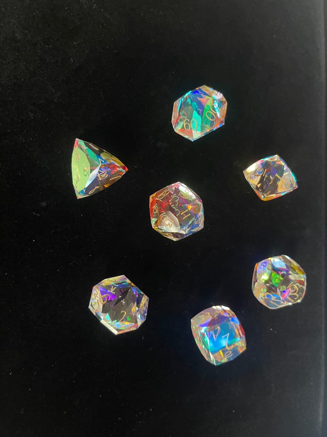 Customer photo review of URWizards D&D Multi-faceted Prism Glass Engraved Dice Set