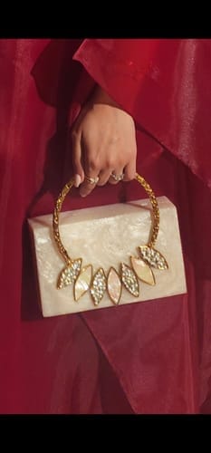 Customer photo review of Thriving All Night Resin Clutch