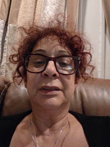 Customer's face showing results after using Shipping Protection cream, which they describe as smooth and non-sticky.