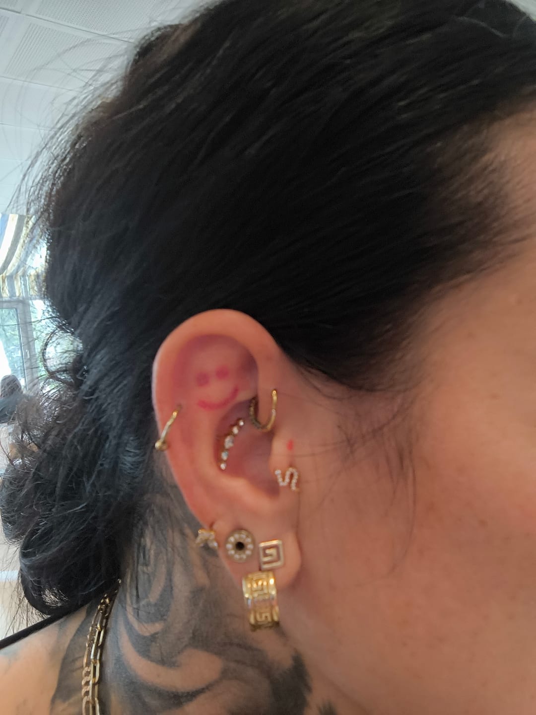 Customer photo review of Glow Snake Piercing | Titan