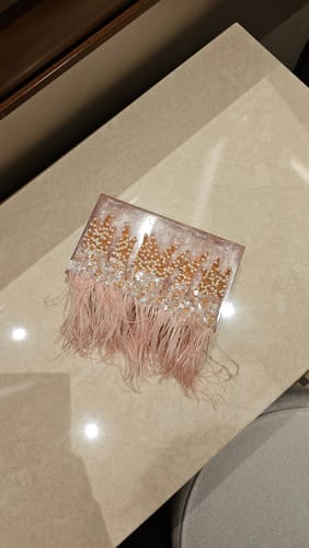 Customer photo review of Shade of Love Feather Clutch