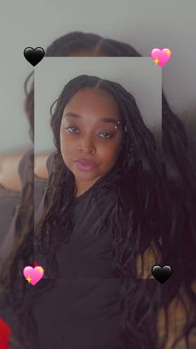Customer's Miracle Knots Crochet Hair in natural black, showing long flowing body wave style on a person.