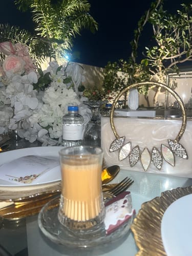 Customer photo review of Thriving All Night Resin Clutch
