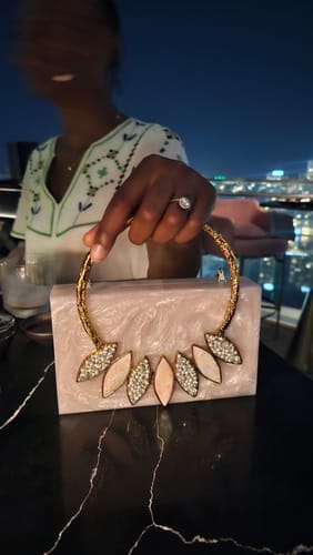 Customer photo review of Thriving All Night Resin Clutch