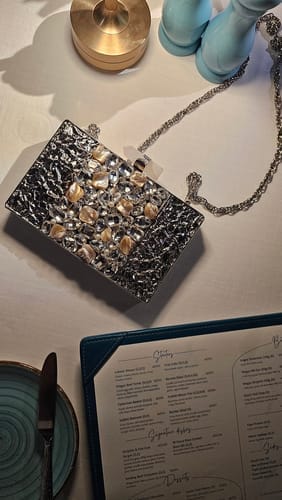 Customer photo review of Spark Your Day Clutch