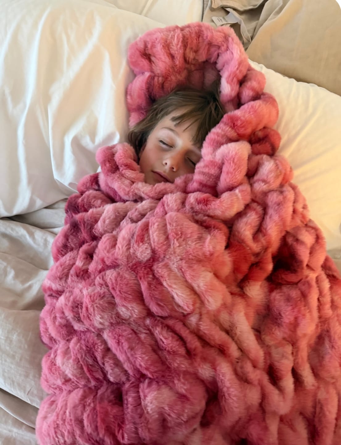 Customer photo review of Hugs Raspberry Swirl Blanket