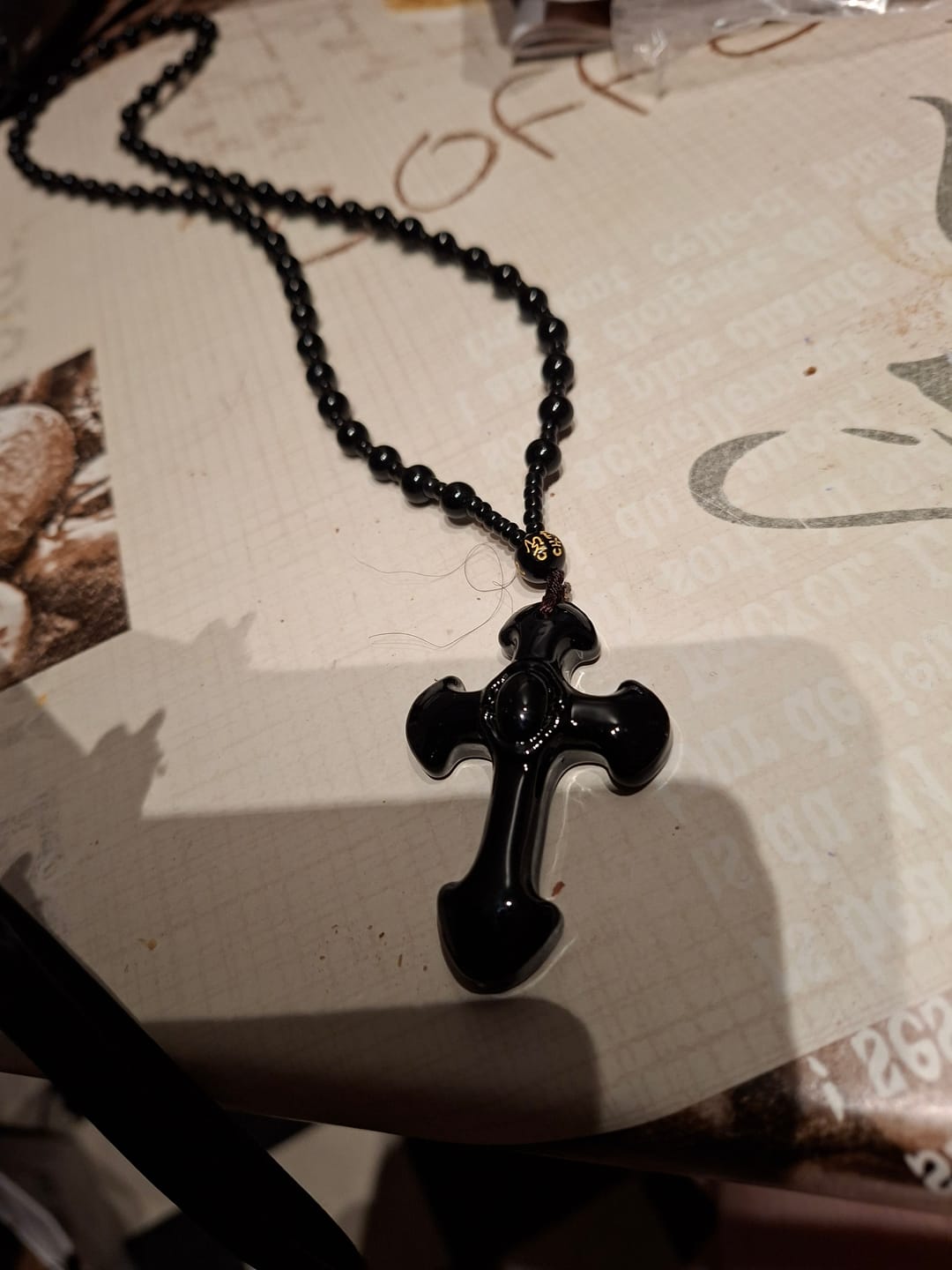 Customer photo review of Olivenorma Obsidian Kreuzsymbol Halskette