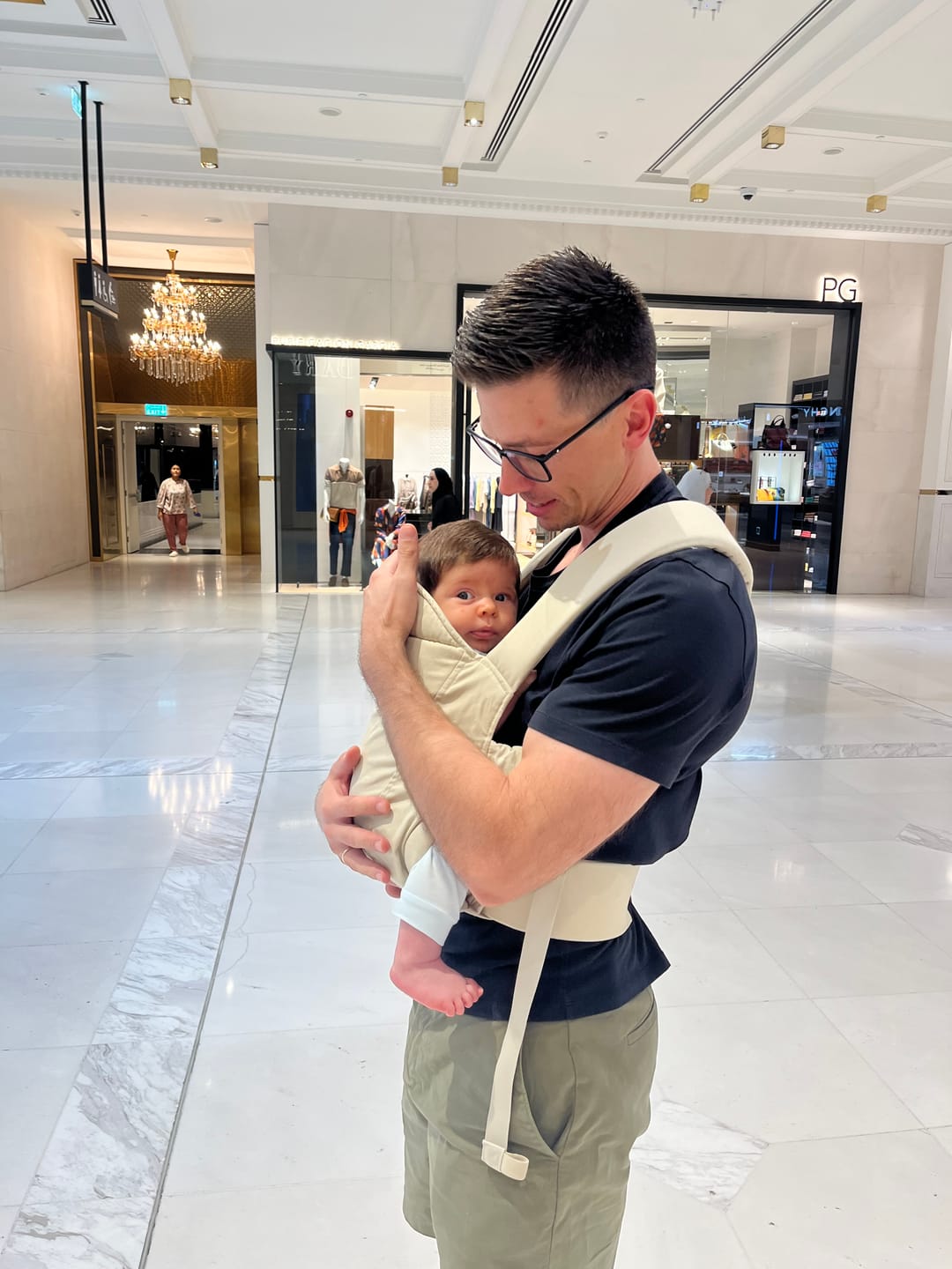 Customer photo review of Momcozy Newborn Baby Carrier (Khaki)