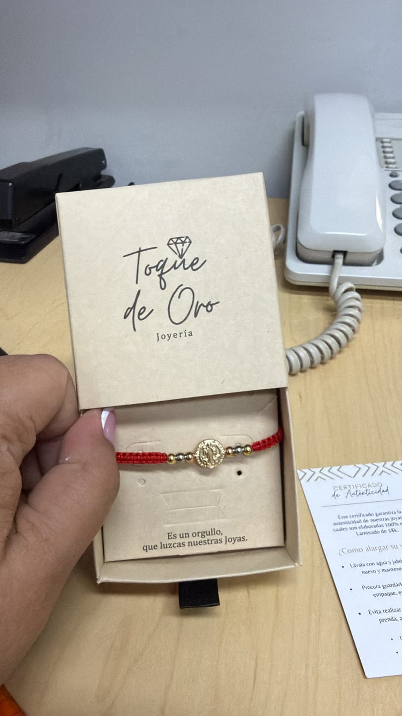 Customer photo review of PULSERA EXCLUSIVA 3 OROS SAN BENITO PROTECTOR.