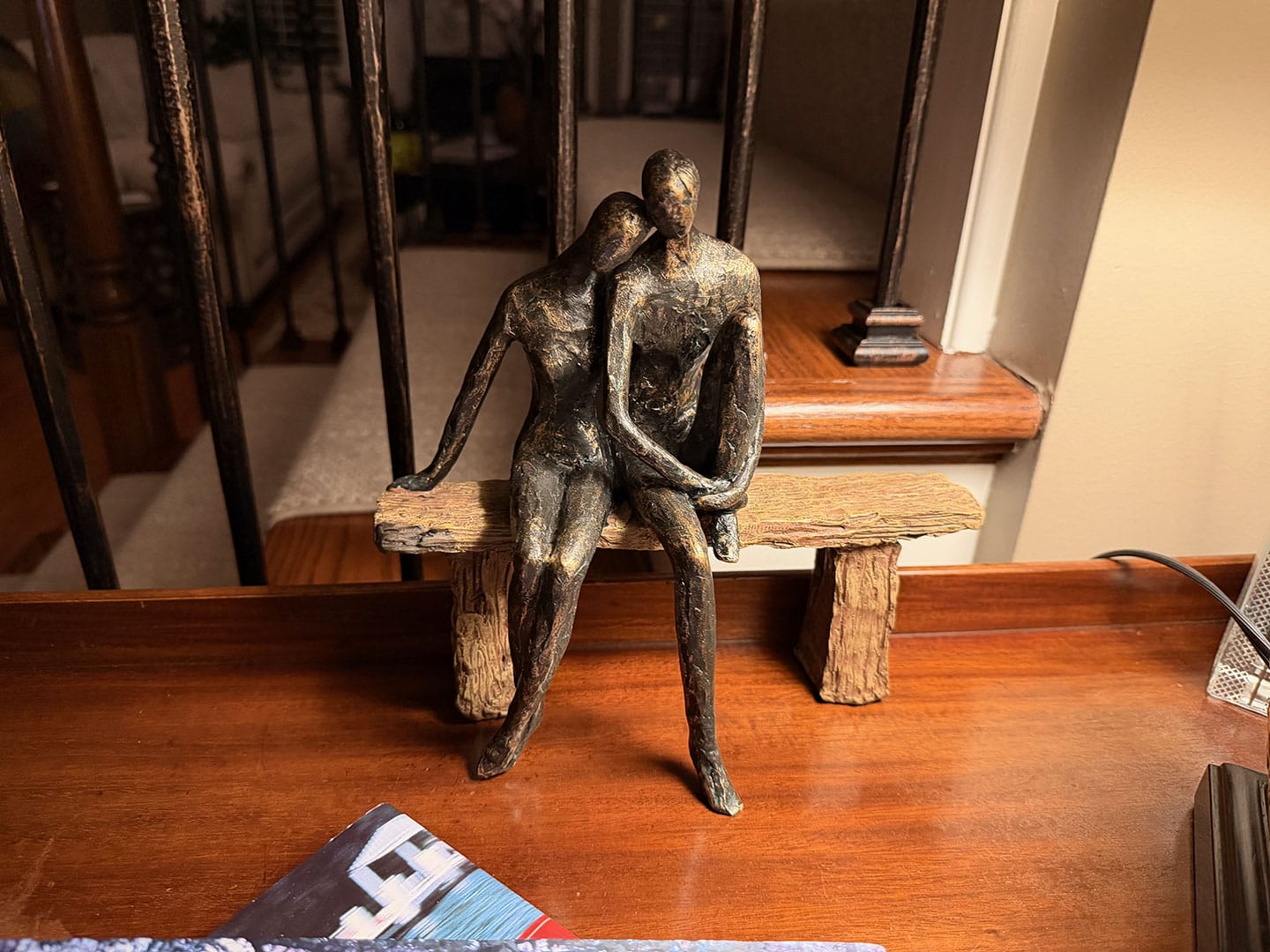 Customer photo review of Couple on Bench Sculpture – Bronze & Wood Effect | Luxury Contemporary Home Décor