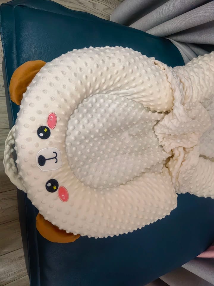 Customer photo review of Patting Animal Baby Nest Pillow