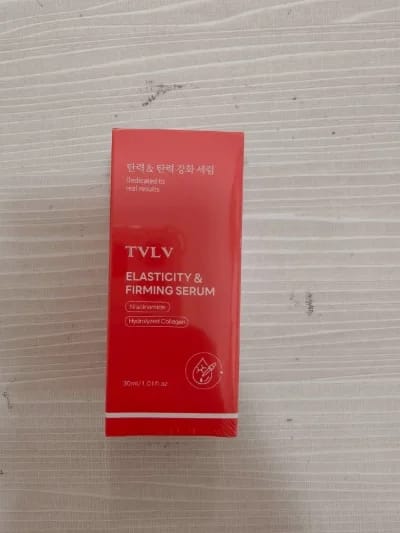 Customer photo review of The Age-Defying Serum