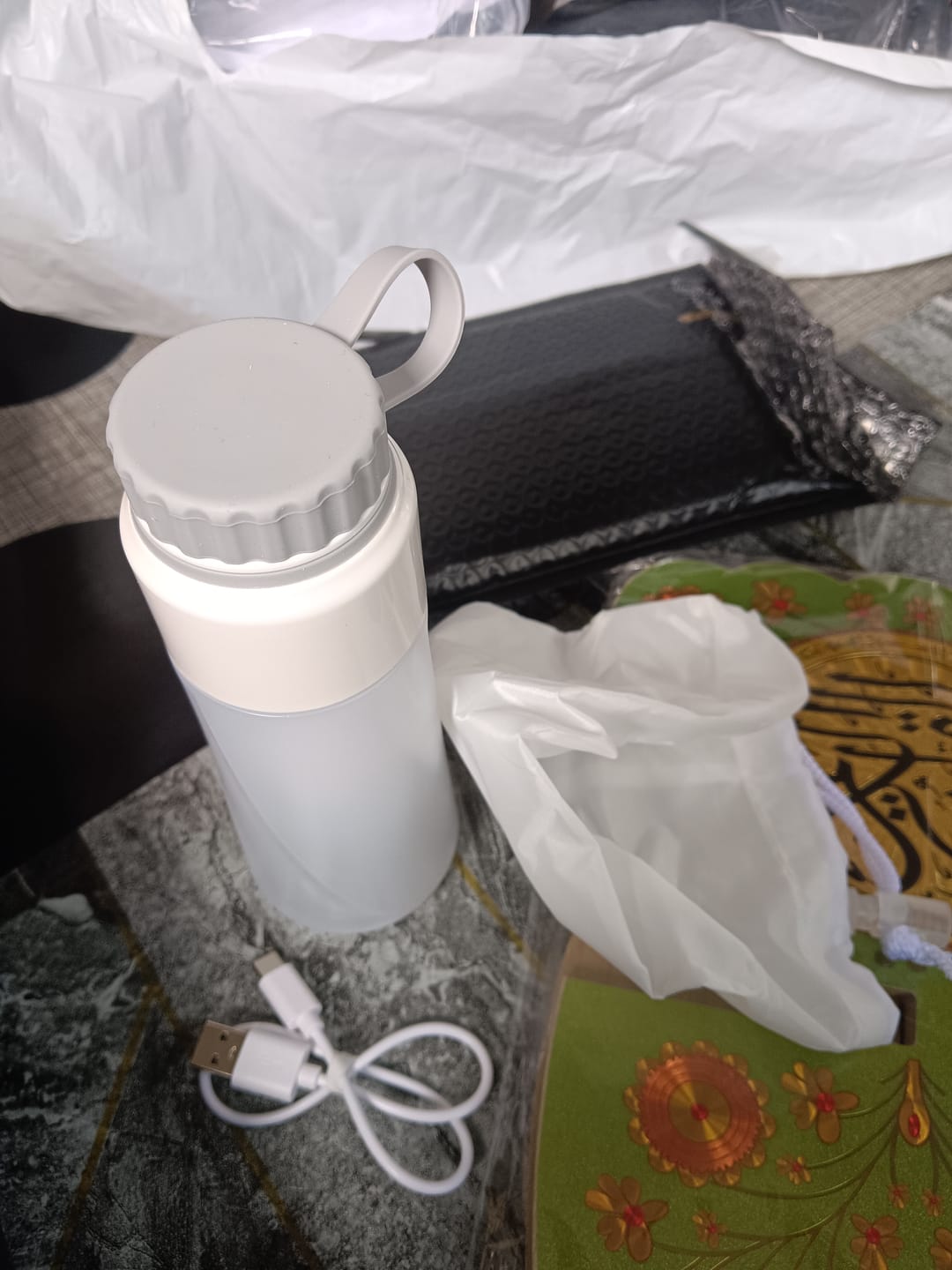 Customer photo review of Portable Electric Bidet Sprayer with Bottle