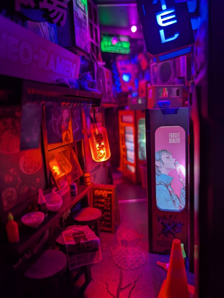 Customer photo review of Neon Ramen MiniAlley Cyberpunk DIY Book Nook Kit, Scale Model Kit,  Japanese Ramen Shop Miniature Scene