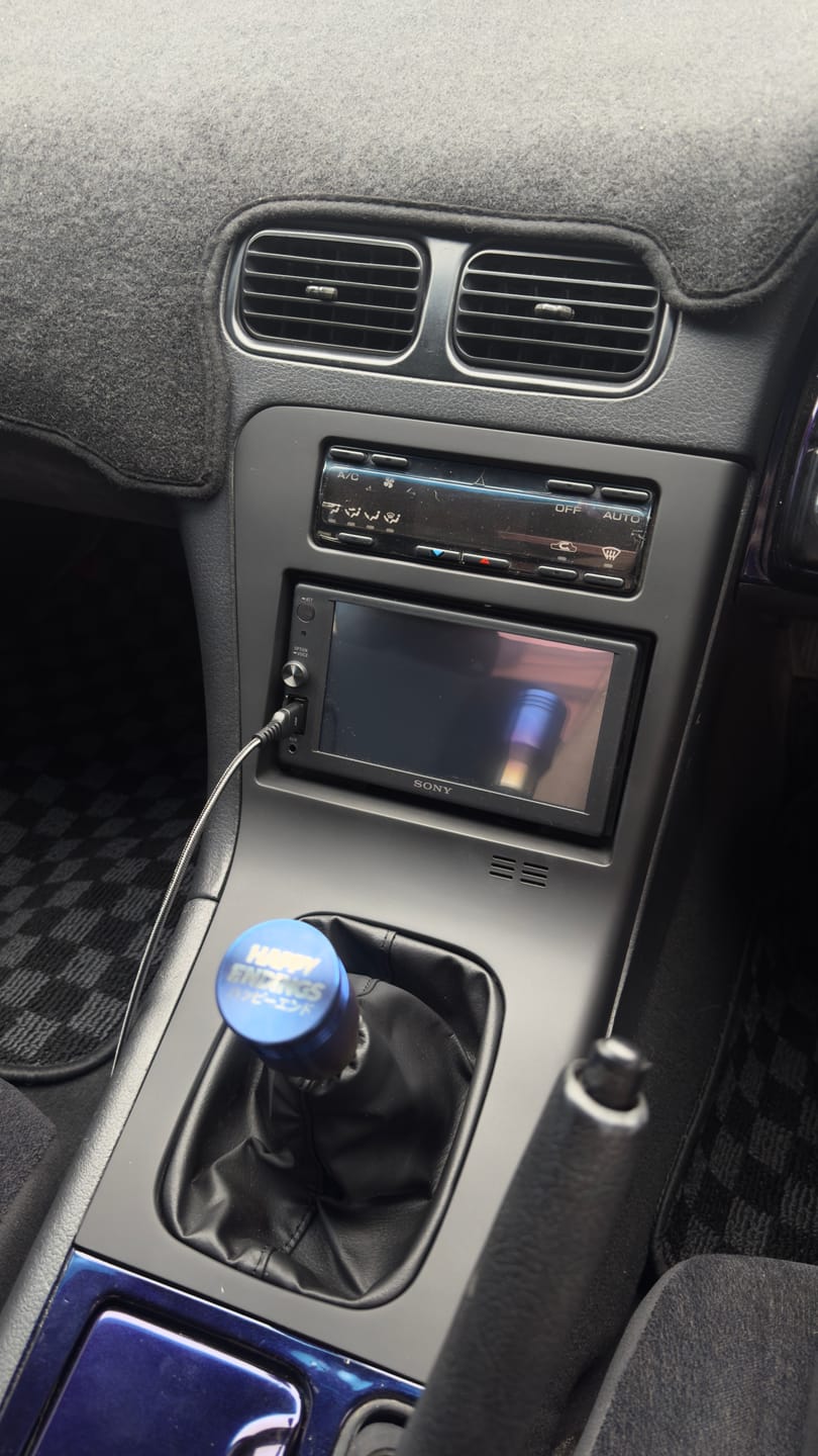 Customer photo review of Nissan Silvia S13 / Nissan 180SX / Nissan 200SX / Nissan 240SX LHD & RHD Center Console Radio / Shifter Trim with Shift Boot Retainer – OEM 68260-40F00 & 96935-35F10 Reproduction