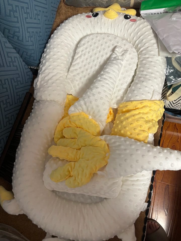 Customer photo review of Patting Animal Baby Nest Pillow