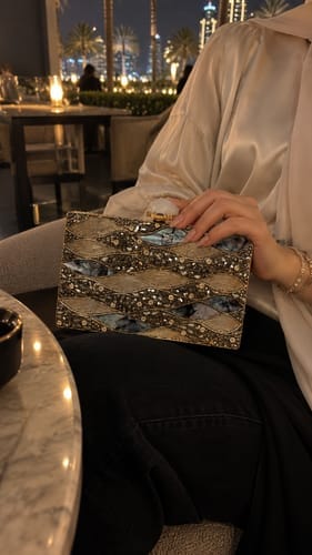 Customer photo review of Shine Beyond Stars Clutch