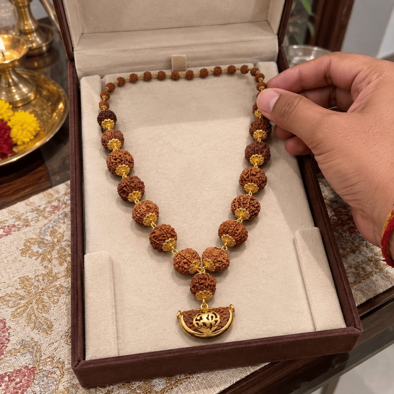 Customer photo review of 1-14 Mukhi Rudraksha Mala (Panchdhatu)