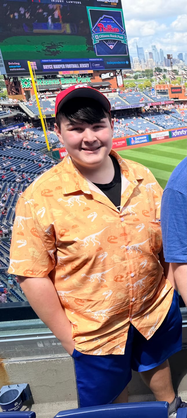 Customer photo review of Orange Dinosaur Bones Button Up Shirt