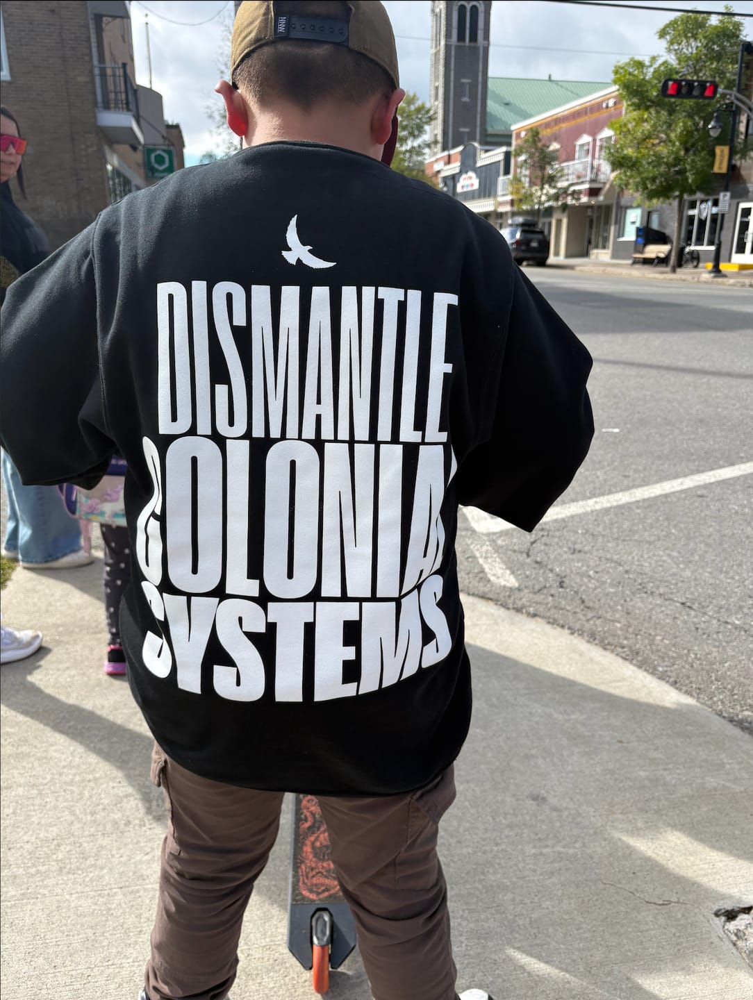 Customer photo review of Dismantle Colonial Systems Crewneck