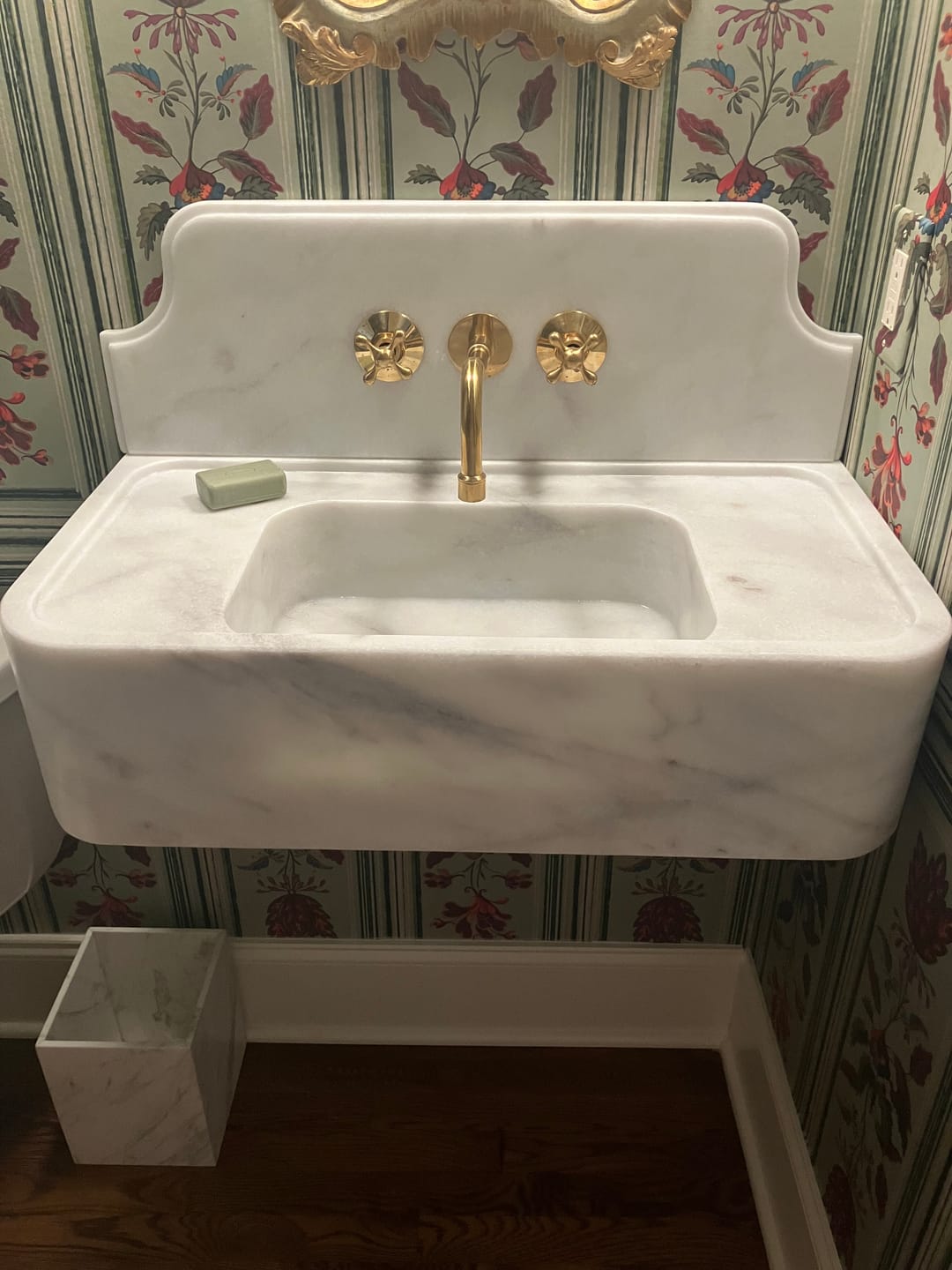 Customer photo review of Unlacquered Brass Curved Wall Mount faucet