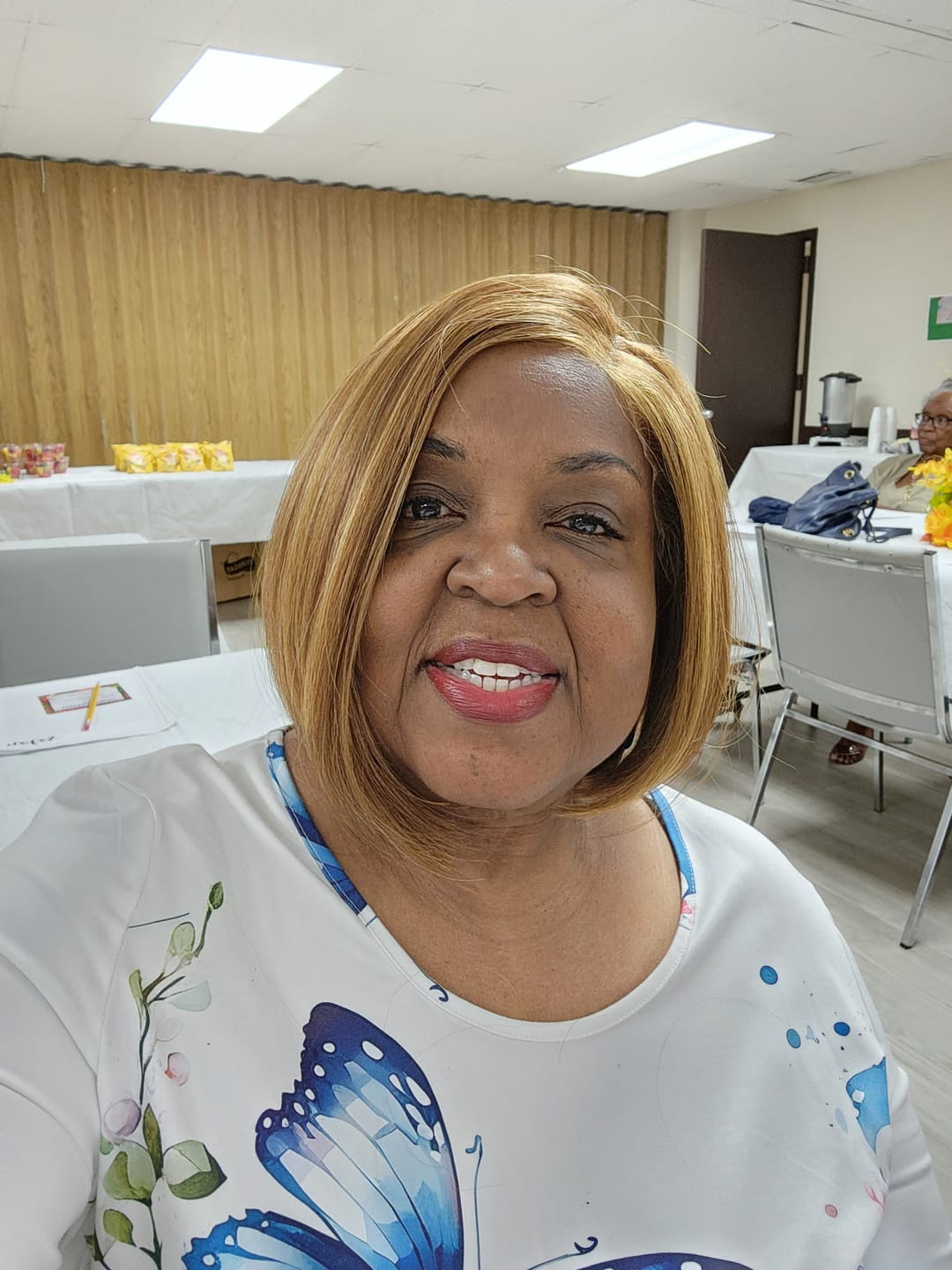 Customer photo review of Outre Melted Hairline Glueless HD Transparent Lace Front Wig - MH 145