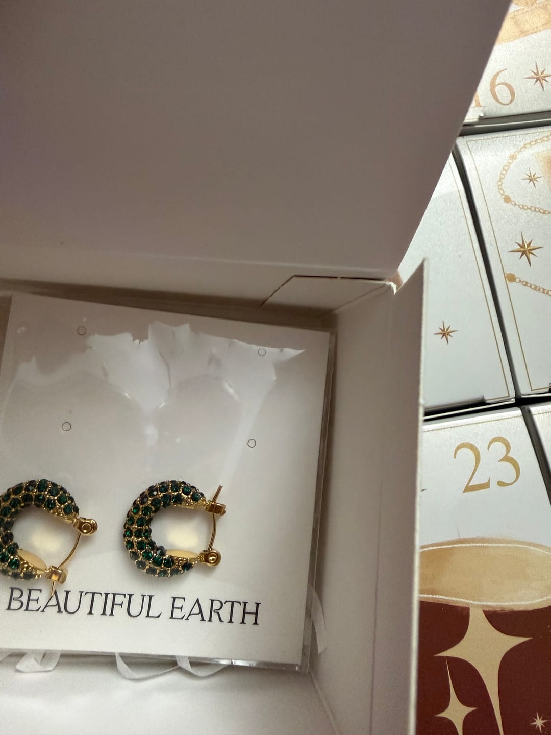Customer photo review of Emerald Beauty Hoop Earrings