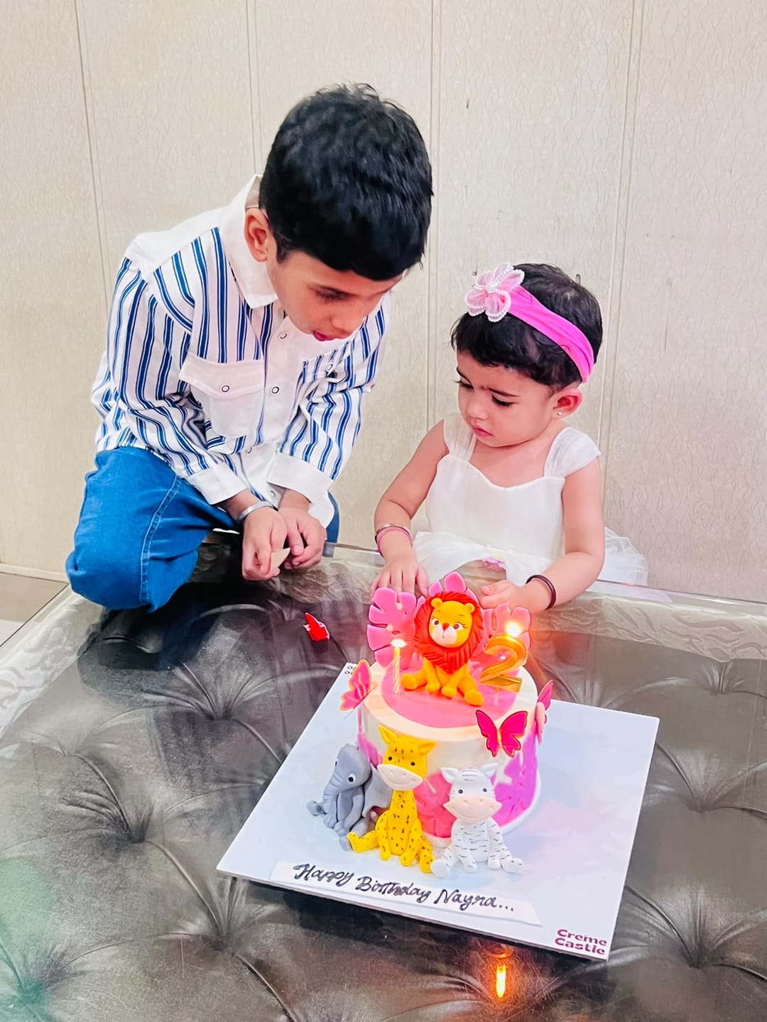 Customer photo review of Jungle theme pink Cake
