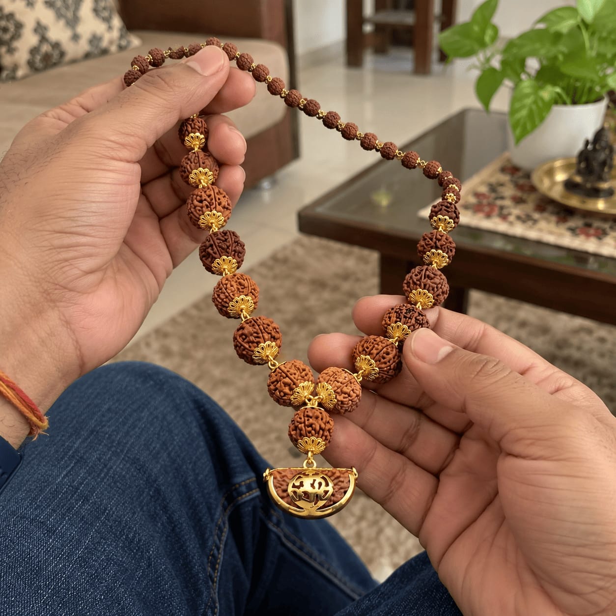 Customer photo review of 1-14 Mukhi Rudraksha Mala (Panchdhatu)