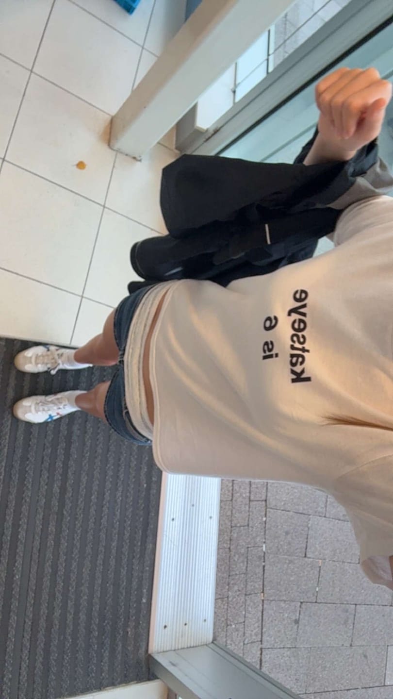 Customer photo review of custom text tee