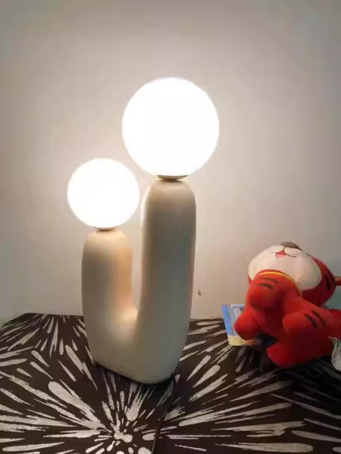 Customer photo review of Oo Table Lamp, White Glass Globe Shade, Ceramic Body, G9, Plug-In