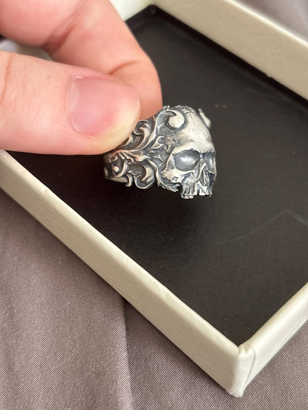 Customer photo review of Baroque Scroll Skull Ring