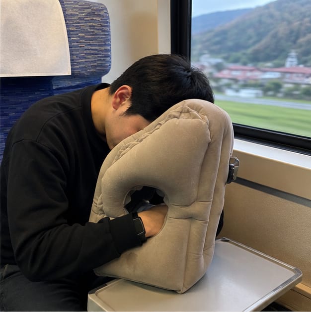 Customer photo review of HushBound Travel Pillow – Real Sleep Sitting Up, Inflates in Seconds