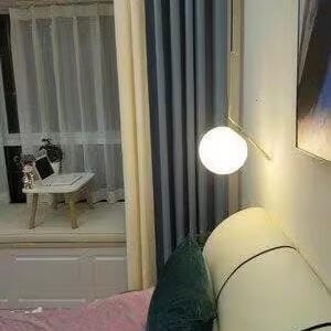 Customer photo review of Globe Pendant Light, White Glass, Brass or Black Stem, 20 cm