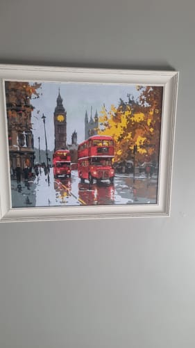 Customer's Timeless London paint by number canvas in a white frame, displaying red buses and Big Ben.