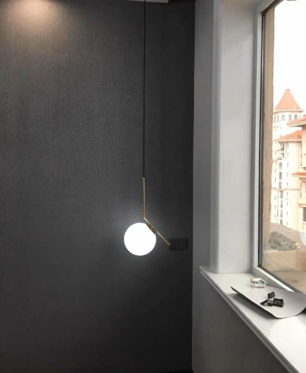 Customer photo review of Globe Pendant Light, White Glass, Brass or Black Stem, 20 cm