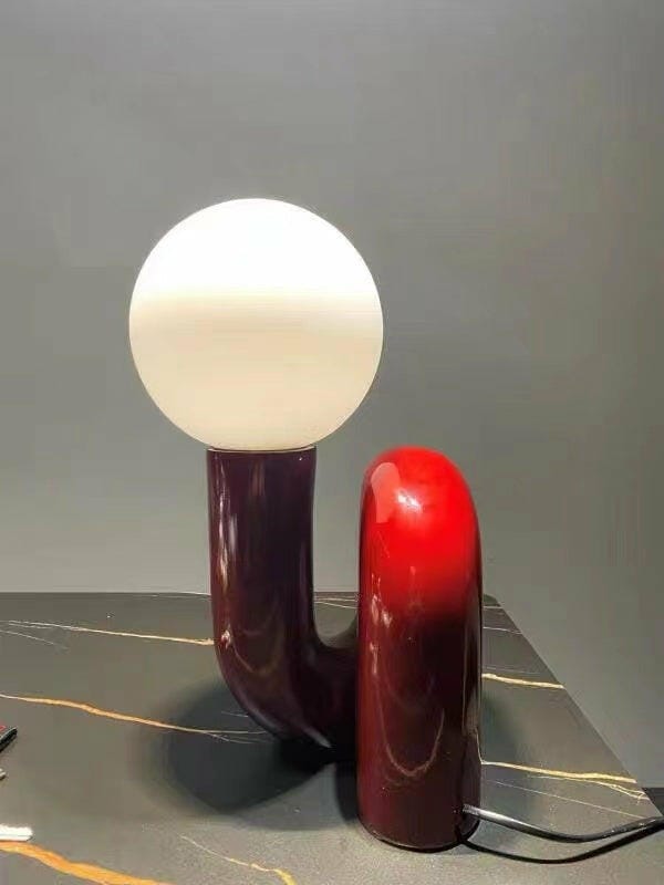 Customer photo review of Globe Table Lamp, White Glass Shade on Curved Resin Base