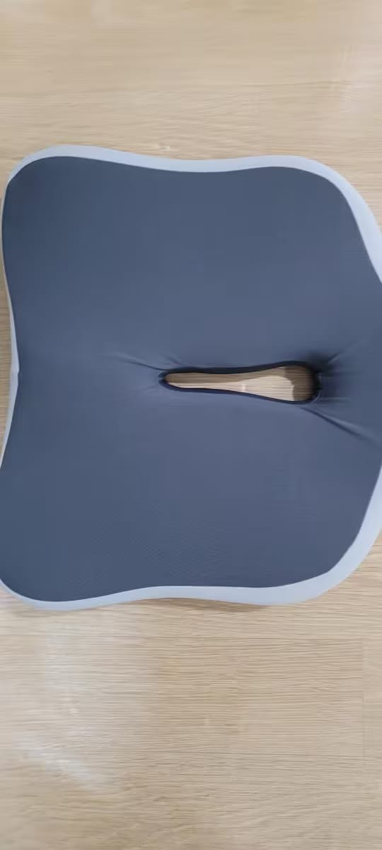 Customer photo review of Coussin Confort Absolu- le coussin ergonomique.